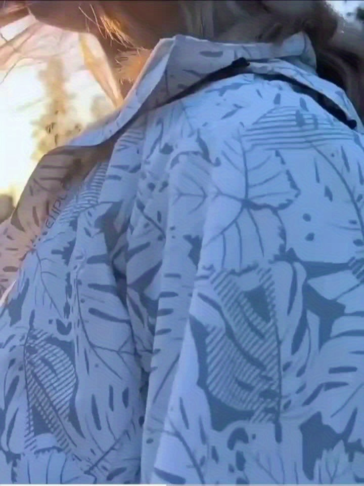 Women's camouflage jacket with a removable hood for outdoor activities. Waterproof and stylish!