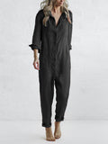 Button down long sleeve jumpsuit for women featuring button front, utility pockets and relaxed fit.