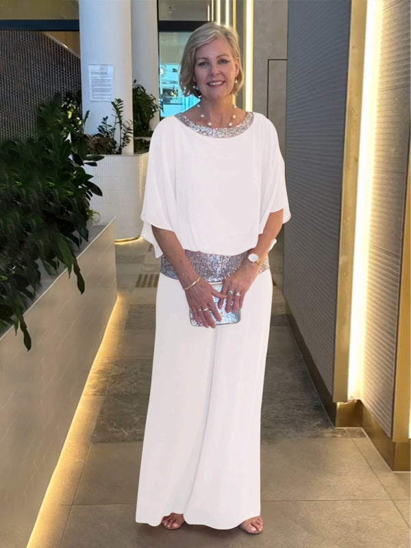 Women's 2-piece wide leg trousers and airy blouse set in a lightweight fabric, perfect for all-season style.