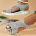 Breathable comfy flat sandals for women with open toe, lightweight, skin-friendly rubber sole.