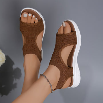 Breathable comfy flat sandals for women: open-toe, slip-on summer footwear with skin-friendly rubber soles.
