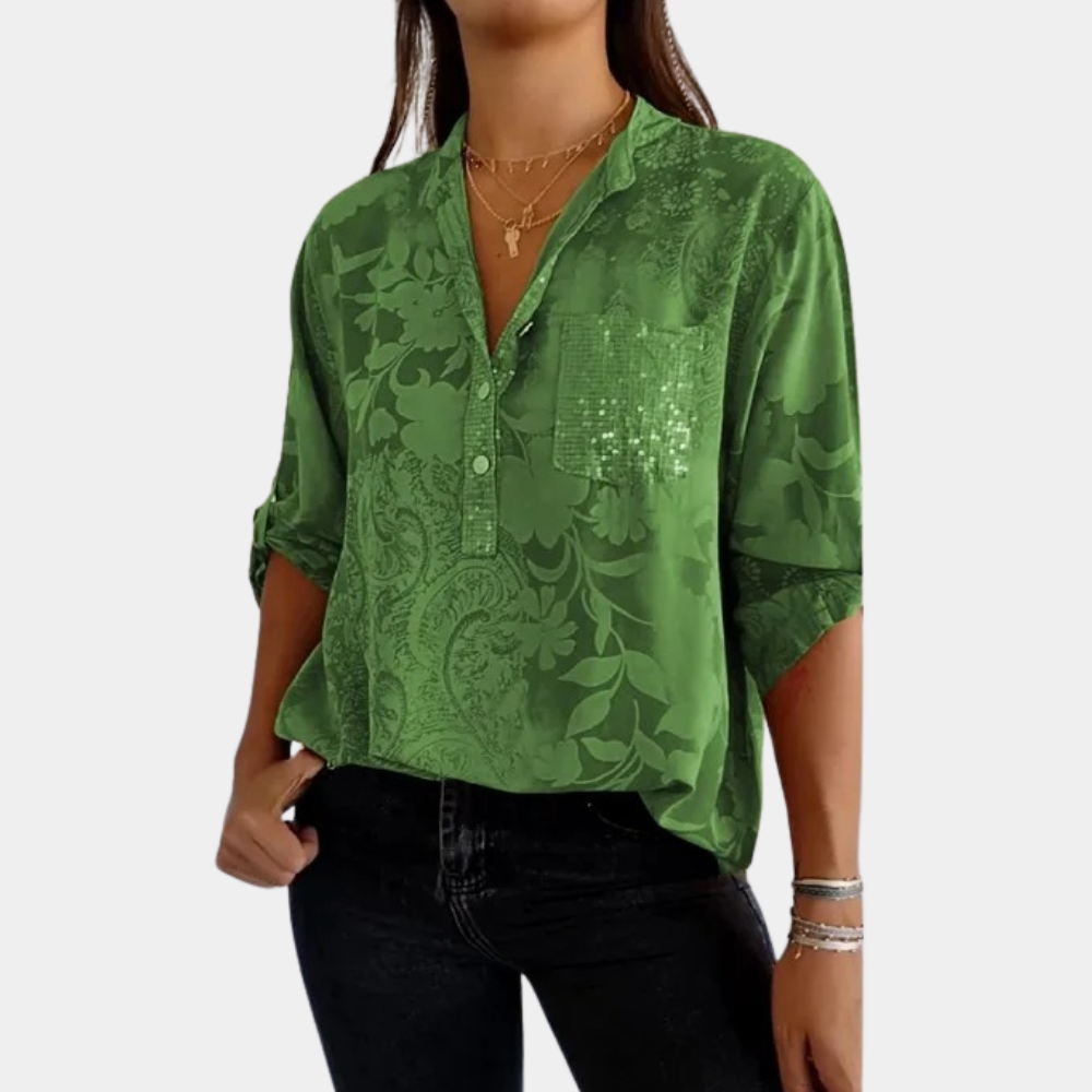 Woman wearing a purple adjustable long sleeve blouse, a versatile and elegant all-season fashion top.