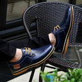 Blue leather breathable lace-up shoes for men, ideal for spring and summer casual style.