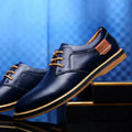 Men's breathable lace-up shoes in brown leather with a durable rubber sole. Perfect for spring & summer casual style.