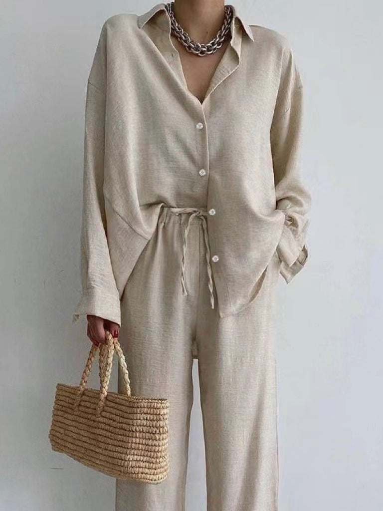 Blouse with Wide-Leg Pants: Flowy linen set for women. Breathable, sustainable all-season style. Elegant and comfortable outfit.