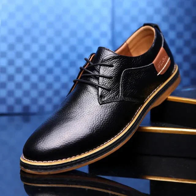 Blue leather breathable lace-up shoes for men: Stylish, comfortable casual footwear for spring and summer.