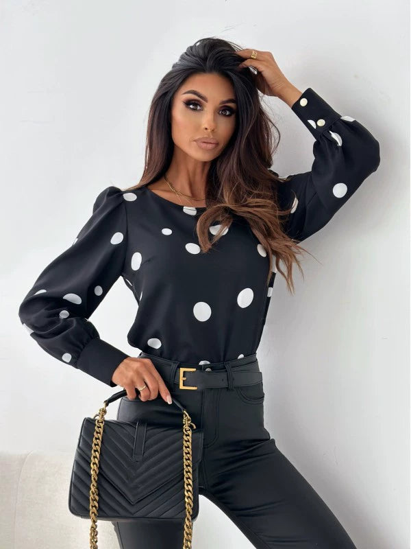 Woman in a breathable polka dot blouse. Classic, stylish and comfortable.