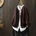 Button down long sleeve cardigan for women in khaki, featuring a relaxed fit and classic button design.