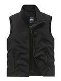 Man wearing active zip up stand collar vest, ideal for running and outdoor activities.