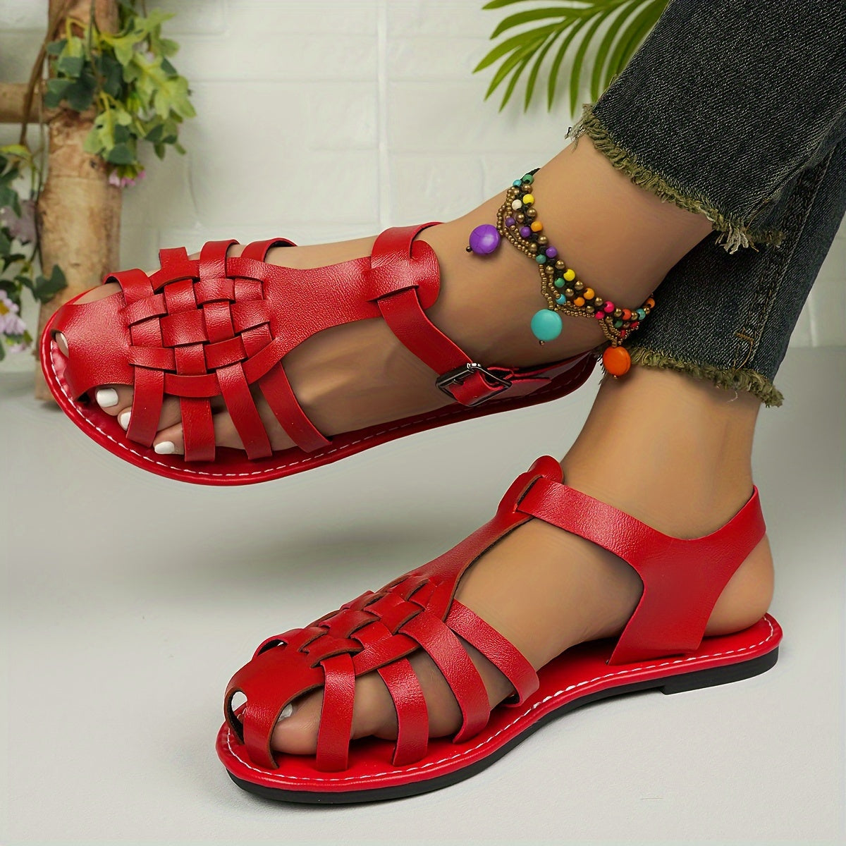 Ankle buckle strap sandals for women, featuring adjustable straps and a comfortable, flat sole.