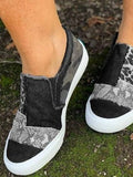 Animal print canvas slip-on shoes, showcasing the casual, lightweight, and breathable design.