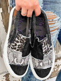 Animal print canvas slip-on shoes: casual, lightweight footwear with a bold, stylish design.