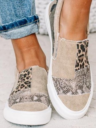 Animal print canvas slip-on shoes: casual, lightweight footwear with a bold animal design.