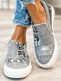 Animal print canvas slip-on shoes, showcasing a stylish and comfortable design for casual wear.