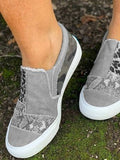 Animal print canvas slip-on shoes, casual lightweight footwear with a bold design.