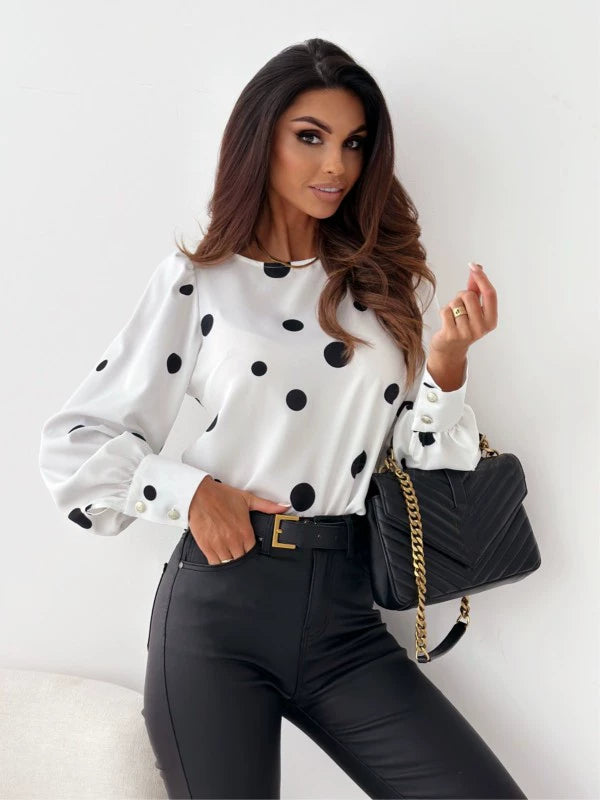 Woman in a breathable polka dot blouse. Classic, stylish and comfortable.