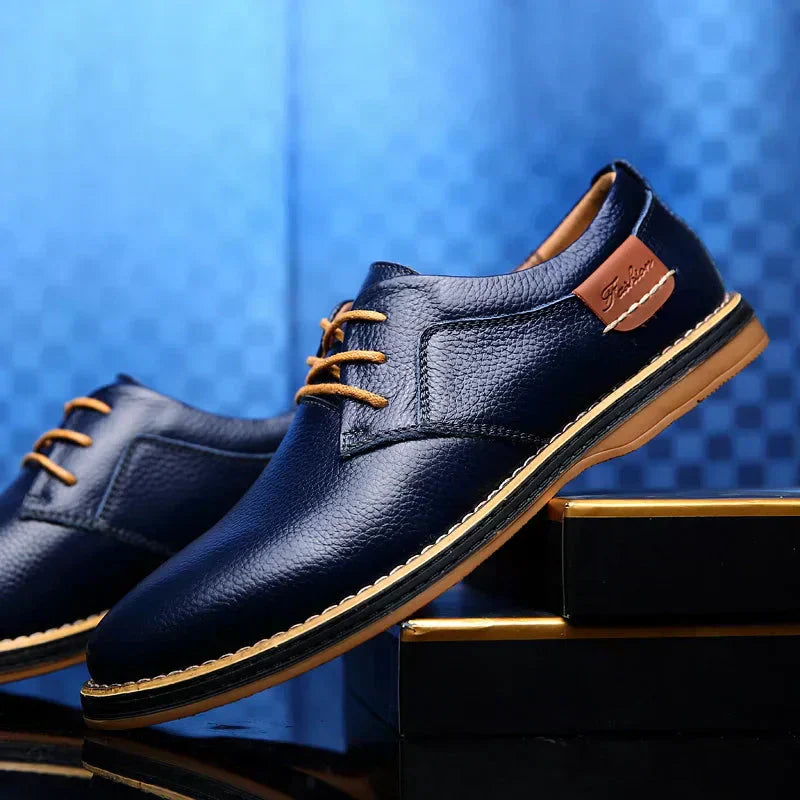 Men's breathable lace-up shoes in brown leather with a durable rubber sole. Perfect for spring & summer casual style.