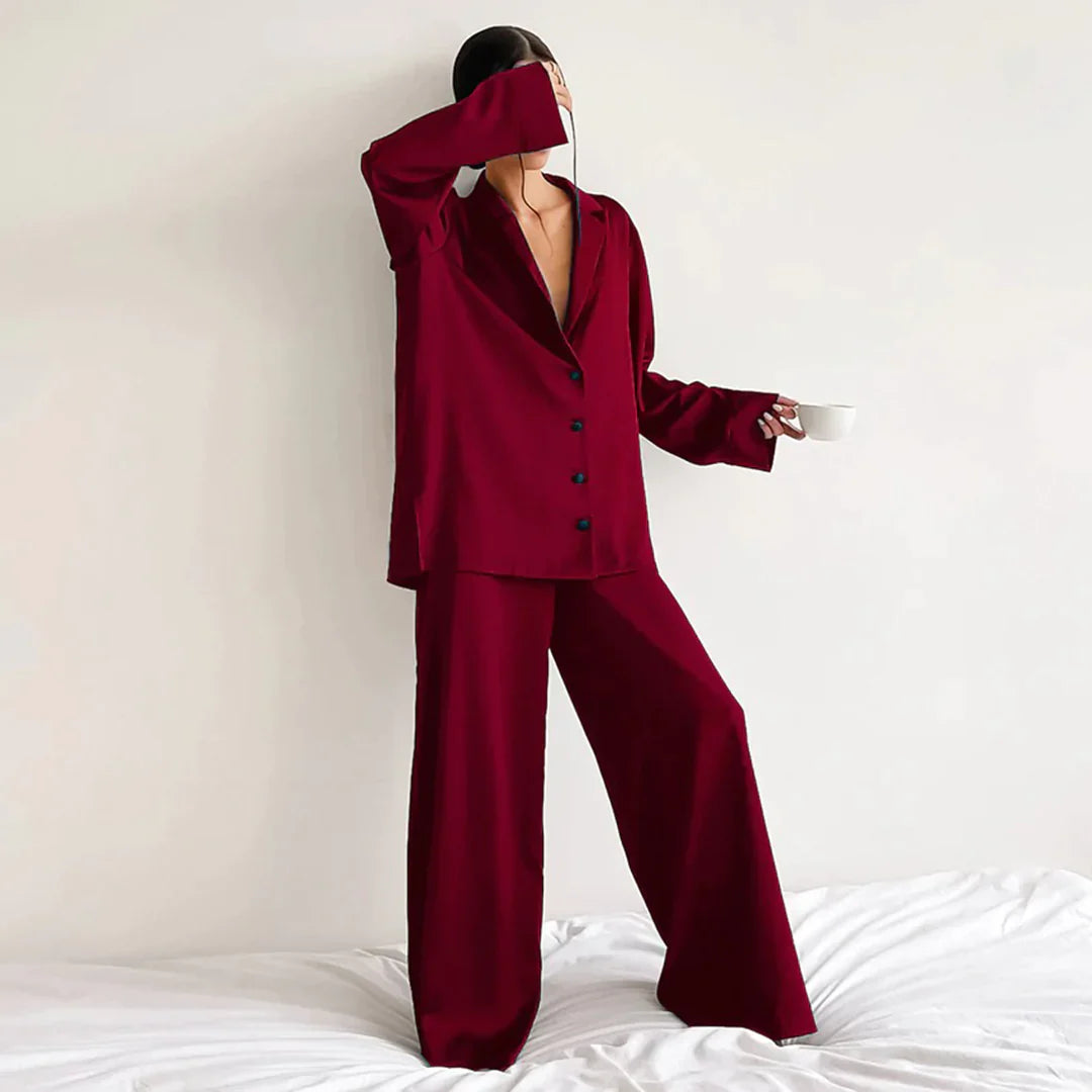 Women's button-down pajama set featuring a classic collared shirt and relaxed-fit pants.