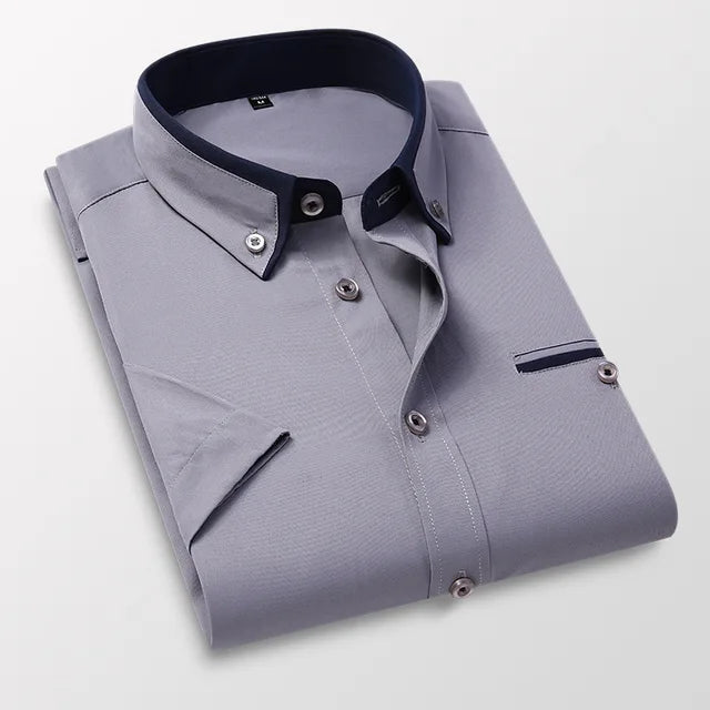 Men's button-down short sleeve collared shirt. Lightweight, breathable fabric, perfect for casual or smart-casual wear.