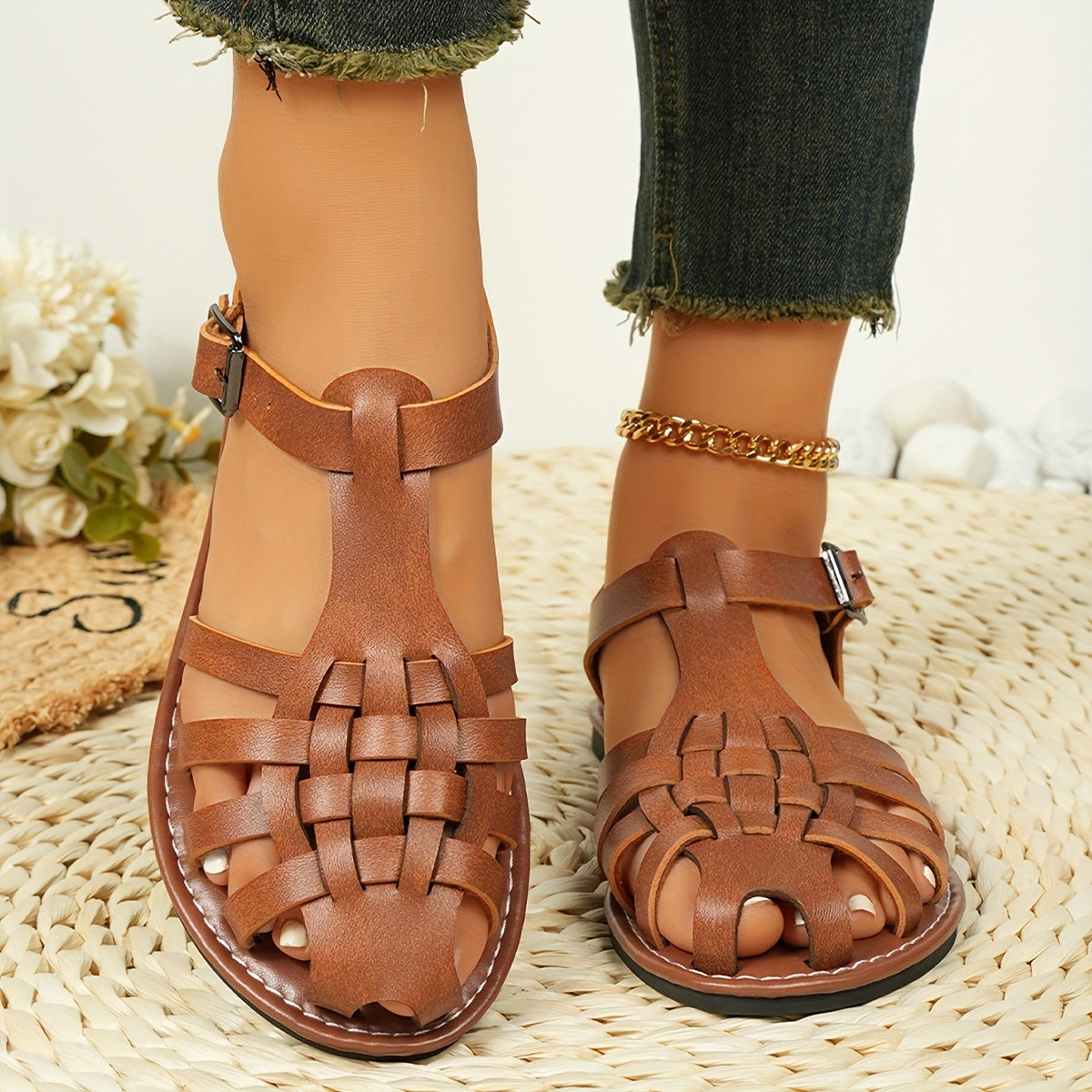 Ankle buckle strap sandals for women, featuring adjustable straps and a cushioned sole.