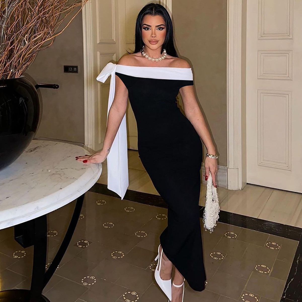 Elegant Off-Shoulder Midi Dress with Oversized Bow Accent